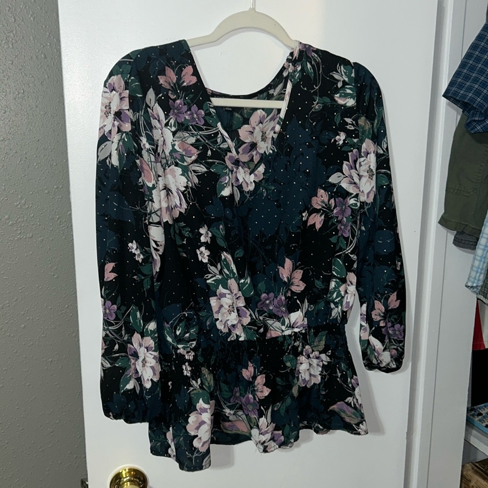 Long sleeve blouse with bottom ruffle detail